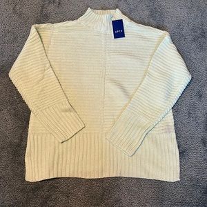 Real sweater size medium!